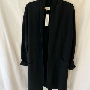 Brand New with Tags Long Black Cardigan with front pockets. Very soft and warm.